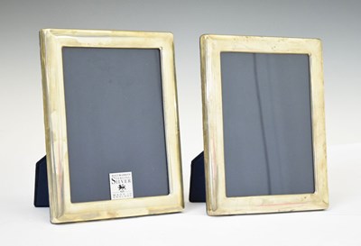 Lot 218 - Pair of Elizabeth II modern silver photograph frames