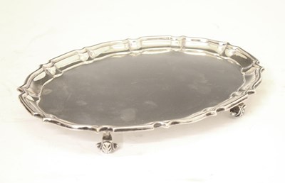 Lot 242 - Edward VII silver oval piecrust card tray/salver