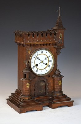 Lot 553 - Junghans oak castle-form mantel or bracket clock