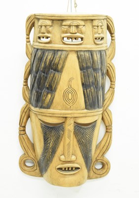 Lot 327 - 1970s African carved wall hanging mask