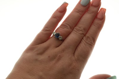 Lot 9 - Sapphire and diamond three stone ring