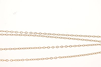 Lot 127 - Two 9ct gold lockets on chains