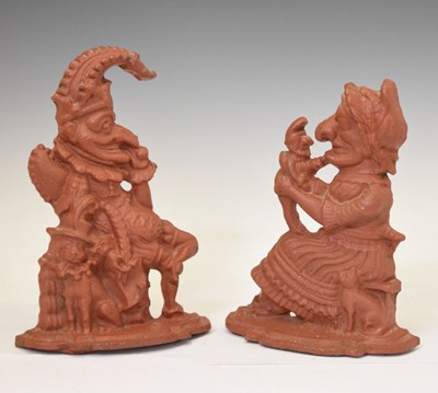 Lot 643 - Pair of red painted cast metal Punch and Judy doorstops