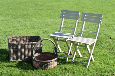 Lot 651 - Pair of folding garden or patio chairs, wicker log bin and basket