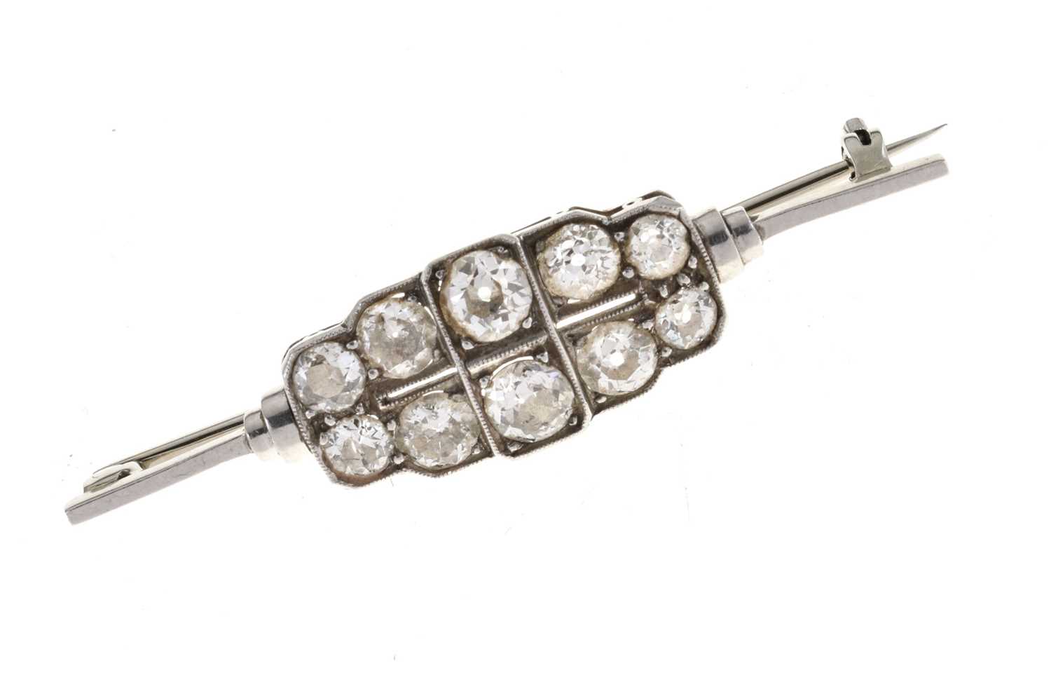 Lot 15 - Ten-stone diamond bar brooch