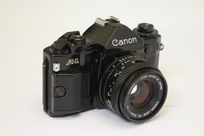 Lot 338 - Canon A-1 camera and Canon Model 7 camera