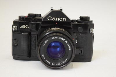 Lot 338 - Canon A-1 camera and Canon Model 7 camera