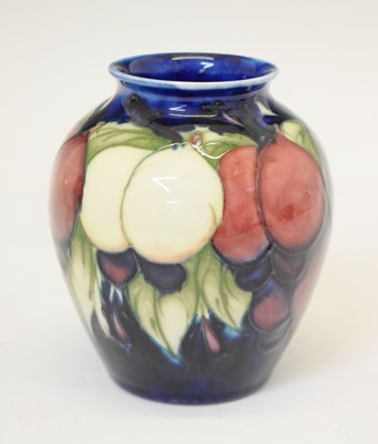 Lot 436 - Moorcroft 'Wisteria' pattern blue ground vase