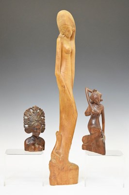 Lot 516 - South East Asian carved figure, together with two Indonesian figures