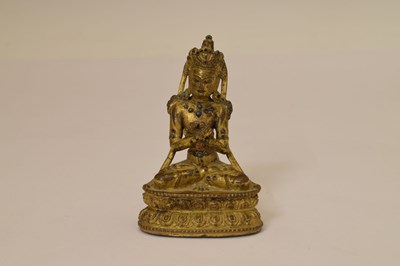 Lot 465 - Small and fine early Tibetan gilt bronze figure of a bodhisattva