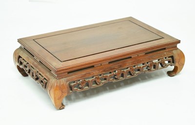 Lot 518 - Chinese carved hardwood low stand