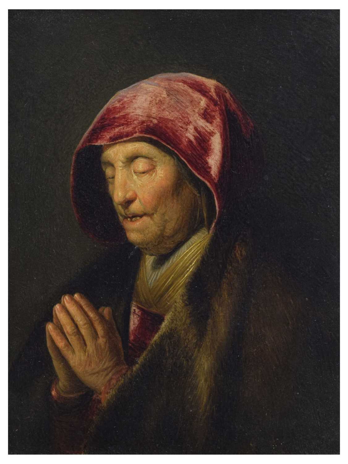 Lot 523 - After Rembrandt Harmensz. van Rijn, (1606-1669) - Oil on panel - Old woman praying