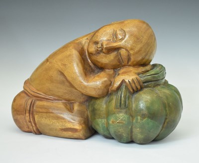 Lot 646 - Carved wooden figure of a sleeping child/monk