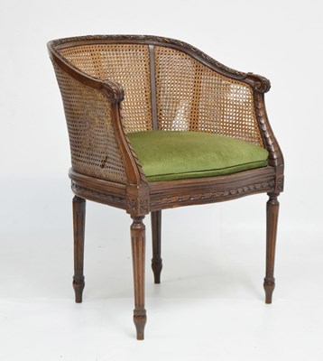 Lot 823 - Early 20th century carved bergere caned tub chair