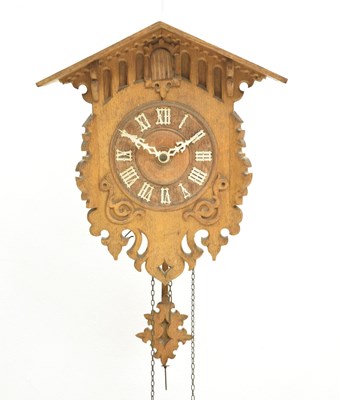 Lot 734 - Oak weight driven cuckoo clock