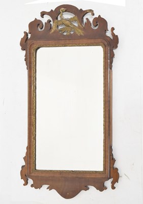 Lot 760 - Walnut fret-frame wall mirror