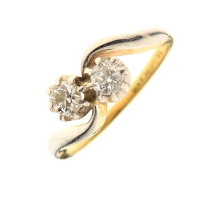Lot 3 - Yellow metal and diamond crossover ring