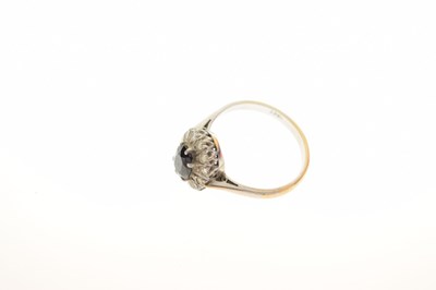 Lot 25 - 18ct white metal, sapphire and diamond cluster ring