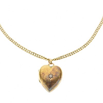 Lot 111 - Yellow metal heart-shaped locket set a single diamond