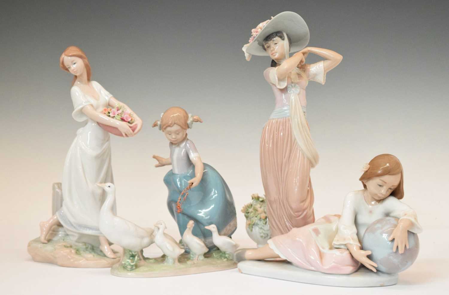 Lot 491 - Lladro - Four porcelain figures