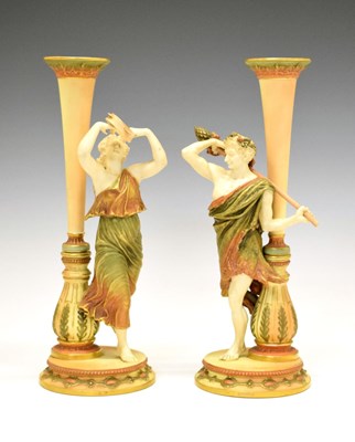 Lot 338 - Royal Worcester figural trumpet vases