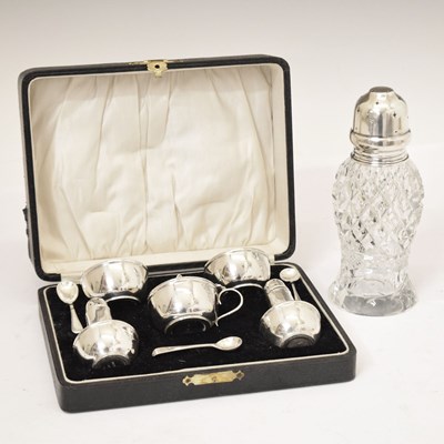 Lot 220 - Cased silver condiment set, together with a George V silver-topped cut-glass sugar shaker