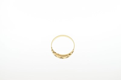 Lot 26 - Unmarked gold ring, gypsy set three white stones