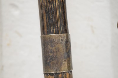 Lot 320 - Edwardian silver capped walking cane, together with four walking sticks
