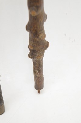 Lot 320 - Edwardian silver capped walking cane, together with four walking sticks