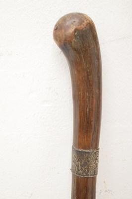 Lot 320 - Edwardian silver capped walking cane, together with four walking sticks