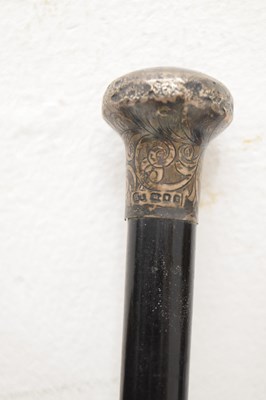 Lot 320 - Edwardian silver capped walking cane, together with four walking sticks