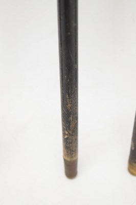 Lot 320 - Edwardian silver capped walking cane, together with four walking sticks