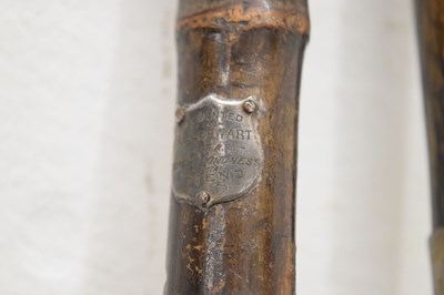 Lot 320 - Edwardian silver capped walking cane, together with four walking sticks