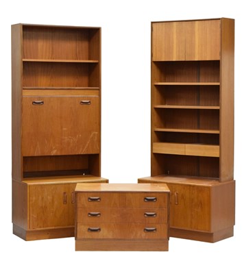 Lot 576 - Two G-Plan teak low cupboards with raised superstructure