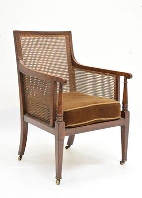 Lot 718 - Oak caned bergère armchair