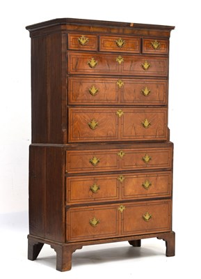 Lot 721 - George III figured walnut chest on chest