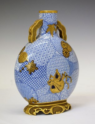 Lot 414 - Royal Worcester Japonaise blue and white ground moon flask