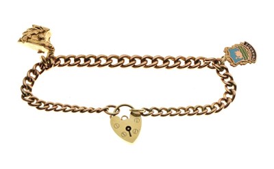 Lot 21 - Yellow metal curb-link bracelet, with 9ct gold padlock, 13.3g