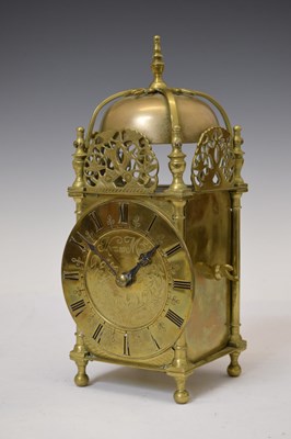 Lot 584 - Brass lantern-style clock, Thomas Mudge