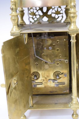 Lot 584 - Brass lantern-style clock, Thomas Mudge