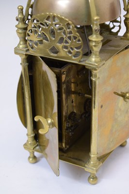 Lot 584 - Brass lantern-style clock, Thomas Mudge