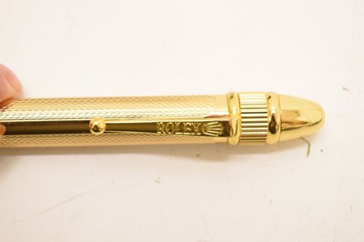 Lot 162 - Rolex - Gilt metal retractable ballpoint pen, pair of dealers gloved and tote bag