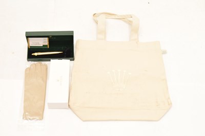 Lot 162 - Rolex - Gilt metal retractable ballpoint pen, pair of dealers gloved and tote bag