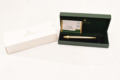 Lot 162 - Rolex - Gilt metal retractable ballpoint pen, pair of dealers gloved and tote bag