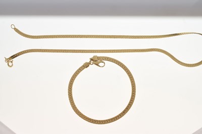 Lot 83 - Yellow metal fancy flat-link necklace and bracelet