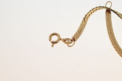 Lot 83 - Yellow metal fancy flat-link necklace and bracelet