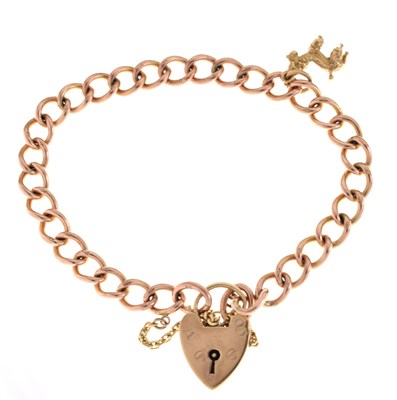 Lot 102 - Yellow metal curb link bracelet with heart-shaped padlock clasp