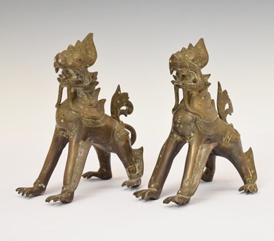 Lot 454 - Pair of antique Burmese bronze 'Chinthe' or temple lions