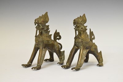 Lot 454 - Pair of antique Burmese bronze 'Chinthe' or temple lions