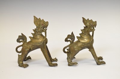 Lot 454 - Pair of antique Burmese bronze 'Chinthe' or temple lions